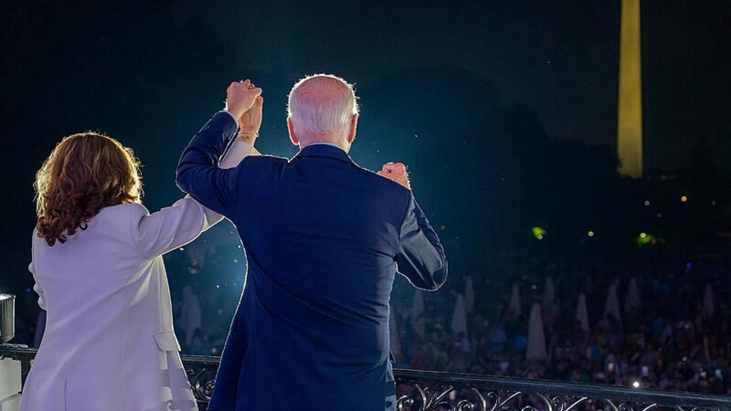 President Joe Biden and Vice President Kamala Harris greet guests at the White House celebration of Fourth of July.