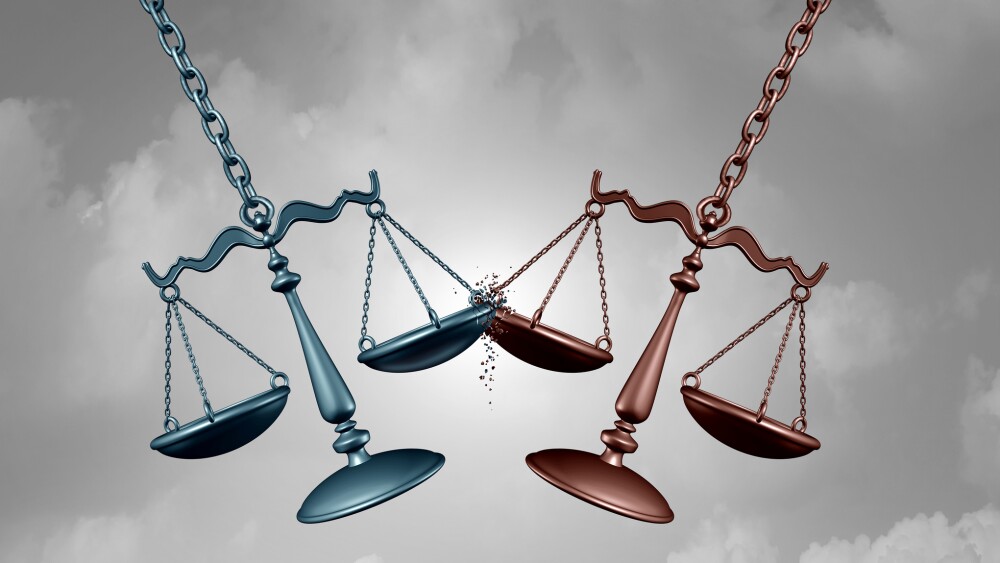 Legal battle lawsuit concept as two justice scales hitting each other as a justice court fight symbol representing a lawyer or attorney representation services with 3D illustration elements.