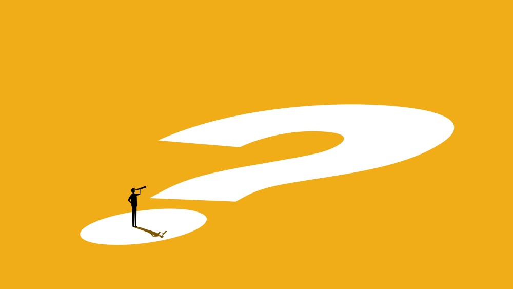 Problems and Challenges. Businessman stands on question mark