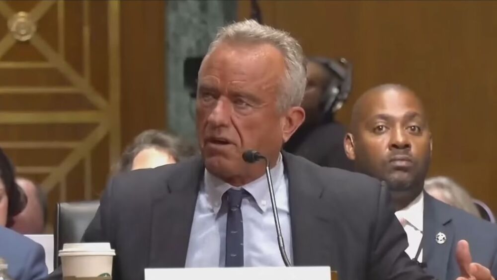 Robert F Kennedy Jr speaking in front of the Senate finance committee