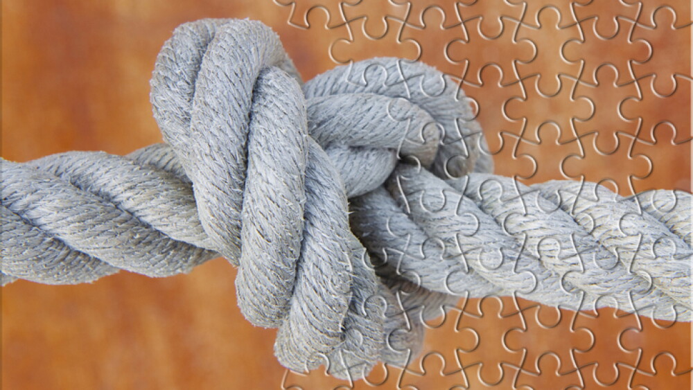 Untie the knots - Troubleshooting - problem solving concept image.