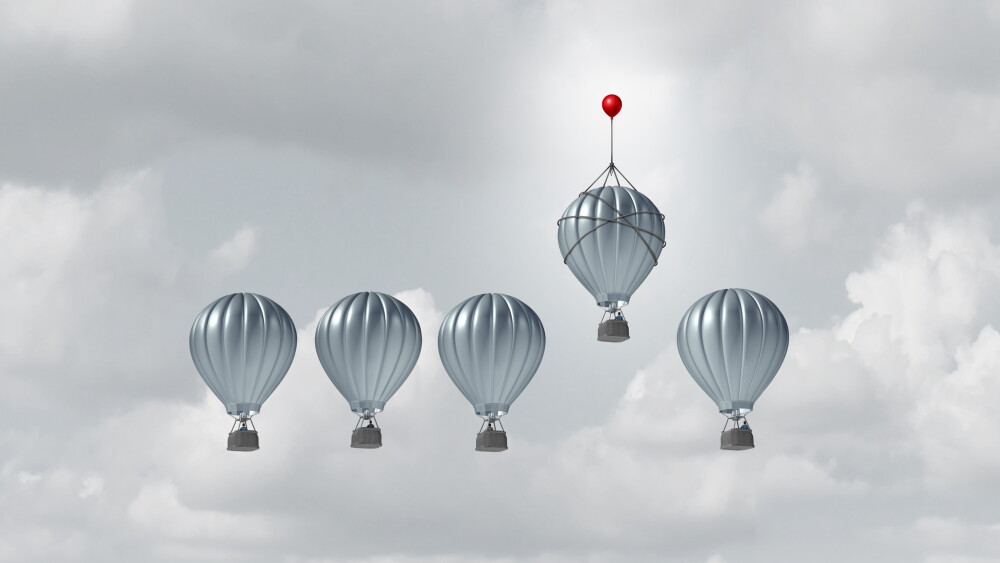 Business competitive advantage success and corporate edge concept as a group of hot air balloons racing to the top but an individual leader with a small balloon winning the competition as a 3D illustration.