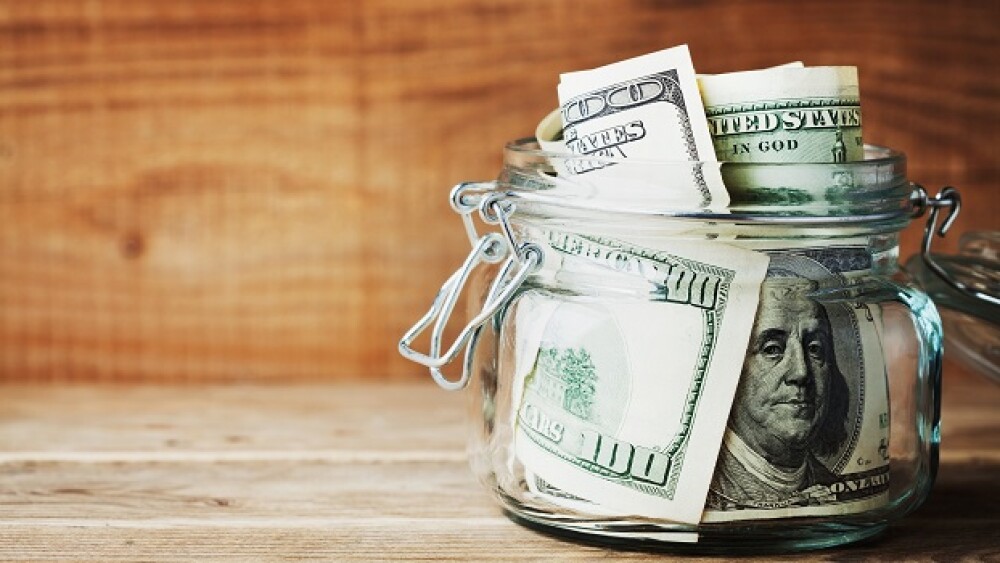 Pictured: Jar of money / Adobe Stock, juliasudnits