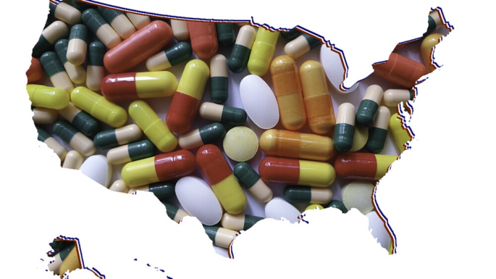 map of United States of America with medicine pills and white background