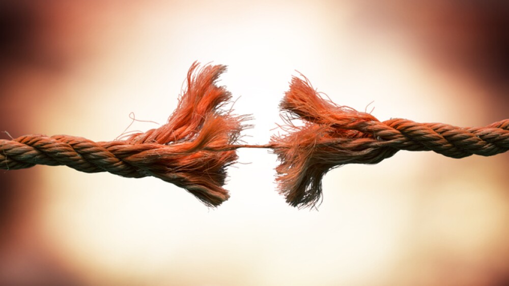 rope that is about to break, with eerie background