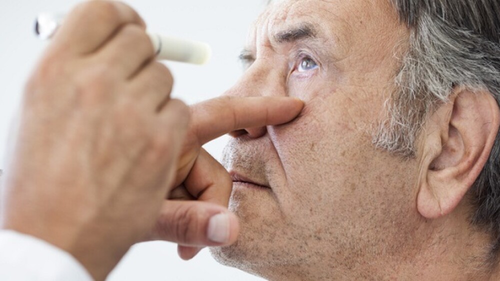 Elderly man examined by an ophthalmologist