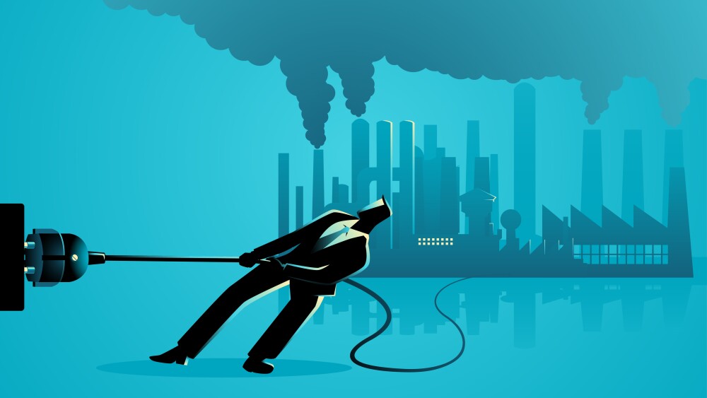 Vector illustration of a businessman unplugging polluted factory