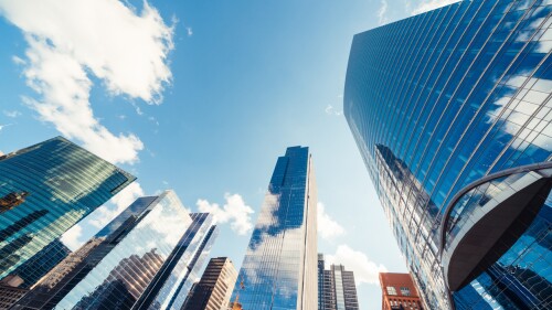 Modern tower buildings in financial district on sunny day in Chicago