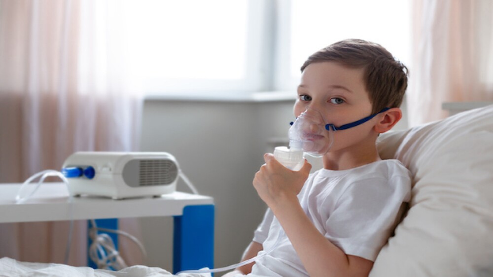 Pictured: a young boy with an oxygen mask/iStock,