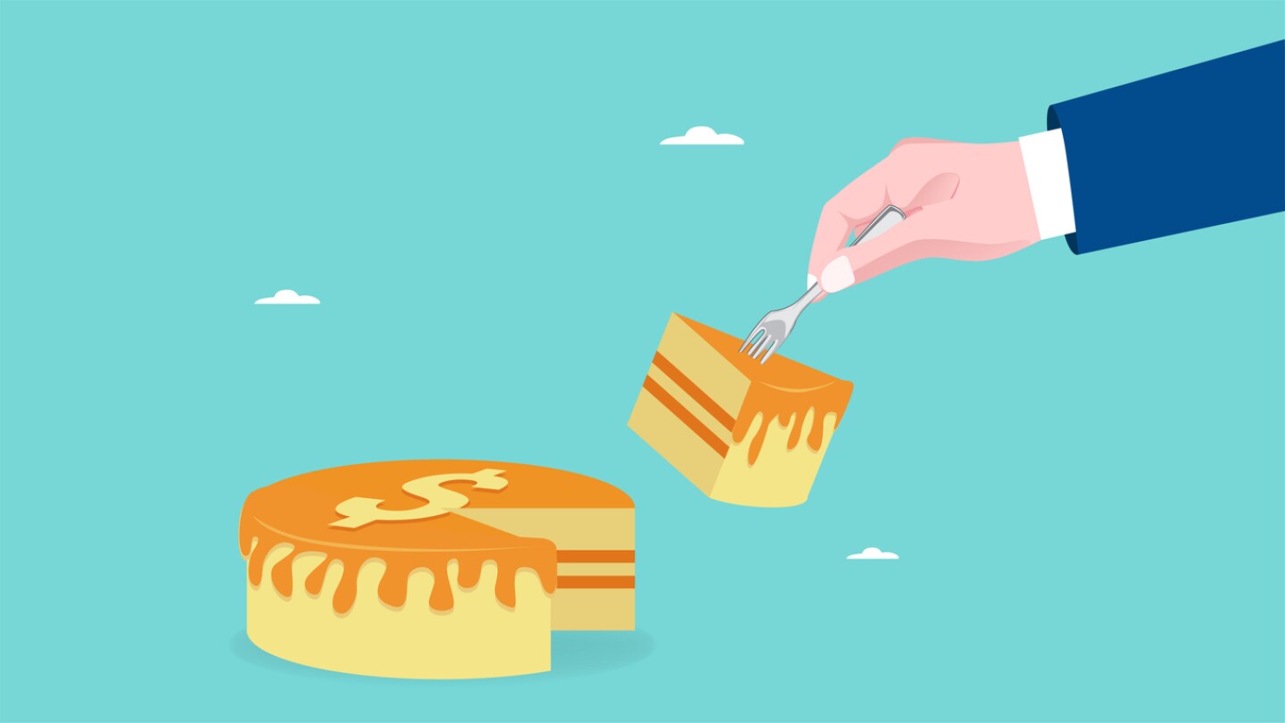 tax payment obligations, Tax officer's hand takes a piece of bread with a dollar logo