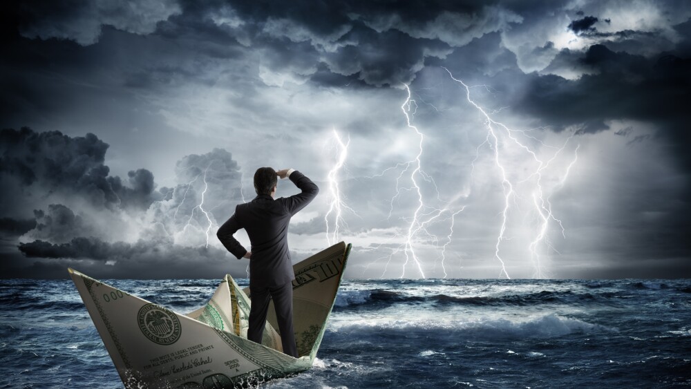 businessman on dollar boat with storm and lightning