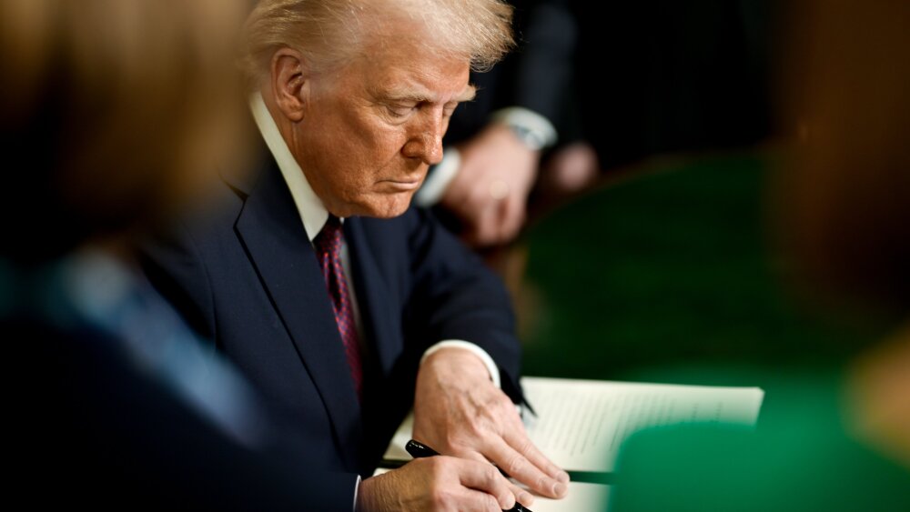 Donald Trump signing an executive order