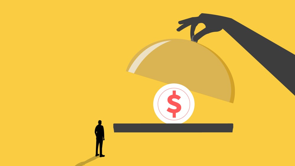 Hand Serving Stack Of Dollar coin Bills On Platter To A Businessman