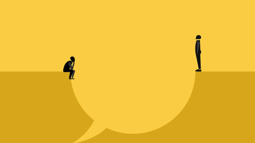 A man and woman on opposite edges of a large chat bubble