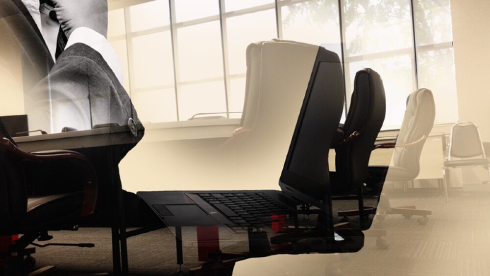 Concept business people work with modern laptop. Double exposure. Meeting room in office building background