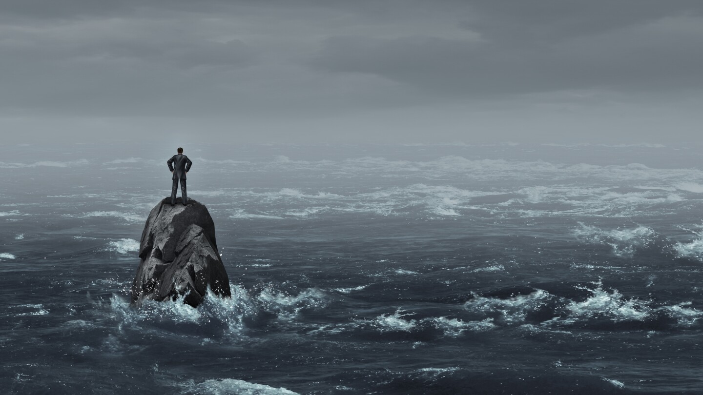 Business despair concept as a stranded businessman lost at sea standing on an isolated rock as a corporate idea for financial crisis or being lost and needing career or financial help to escape in a 3D illustration style.