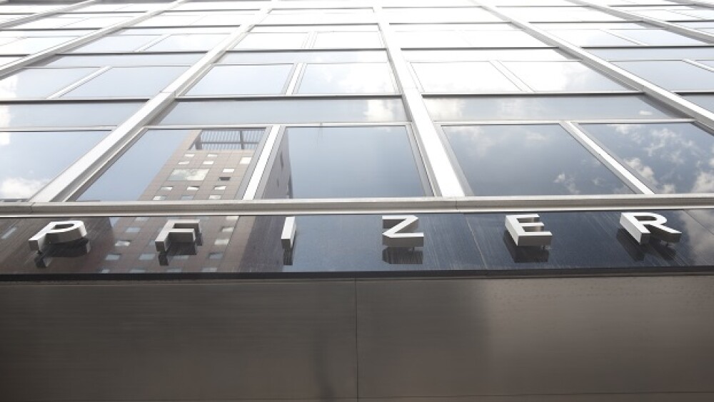 Manhattan, New York USA - July 9, 2011: Pfizer letter sign on the building's Headquarters. Pfizer's is the largest pharmaceutical company in the world.