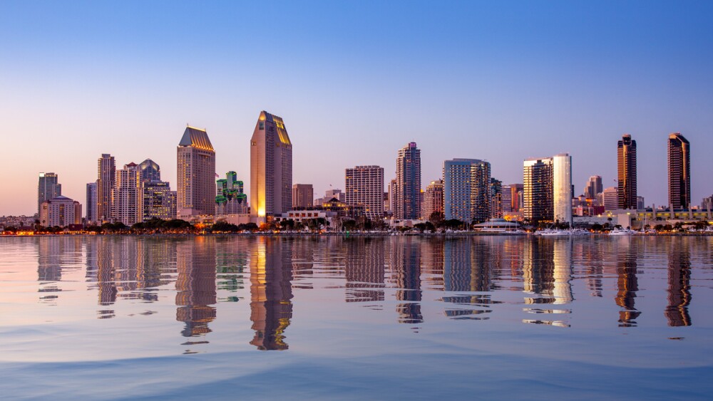 Sunset illuminates the tall skyscrapers of San Diego, California