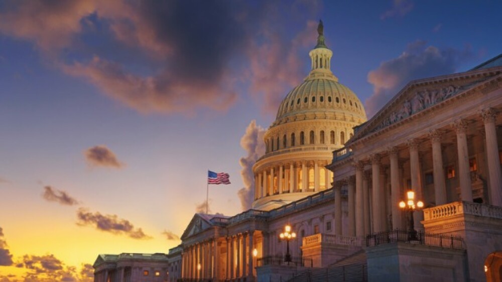 External view of the U.S. Capitol building at sunset 