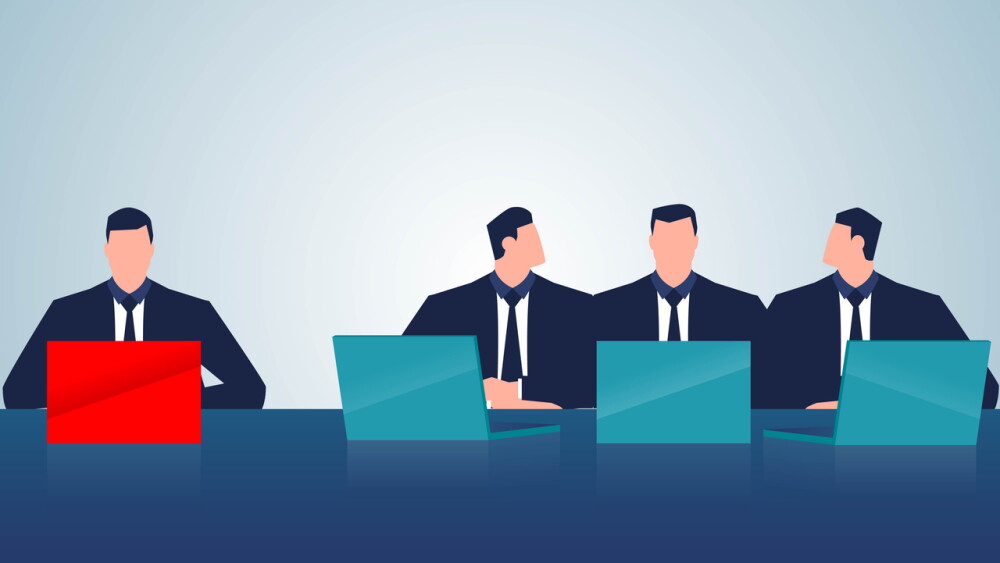 Three businessmen discussing work isolating another businessman