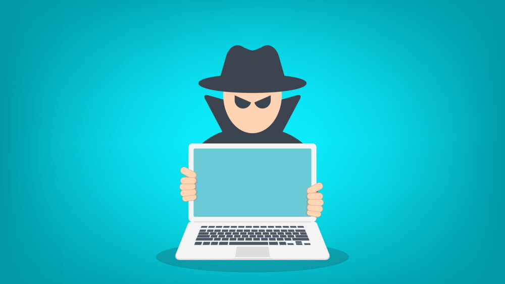Hacker with laptop computer stealing confidential data, personal information and credit card detail. Hacking concept
