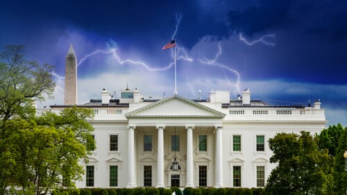 Storm moody sky over White House, residence and workplace of the president of the United States, concept shot