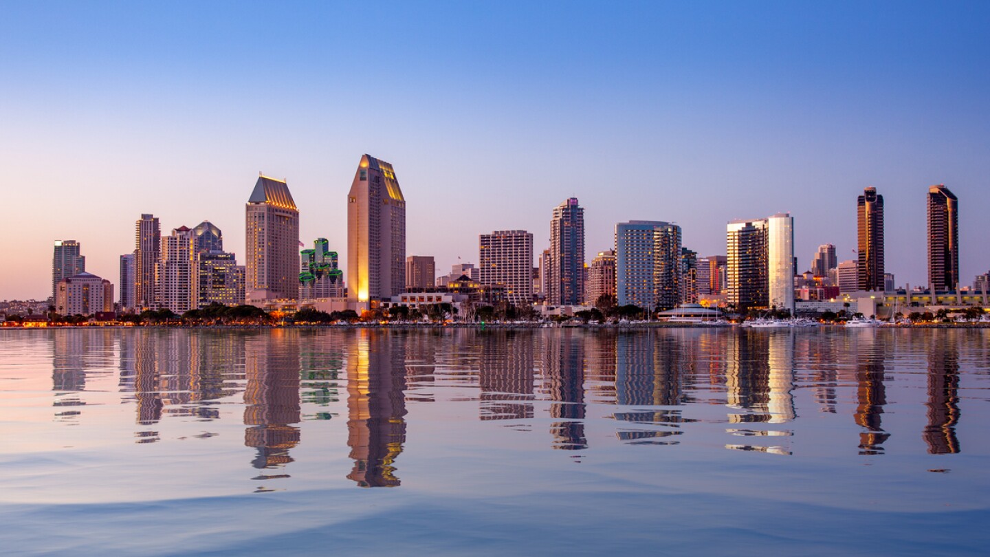 Sunset illuminates the tall skyscrapers of San Diego, California