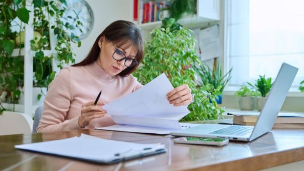 Pictured: Female regulatory professional works rem