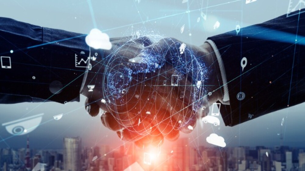 Pictured: Businessmen handshake/iStock, metamorwor