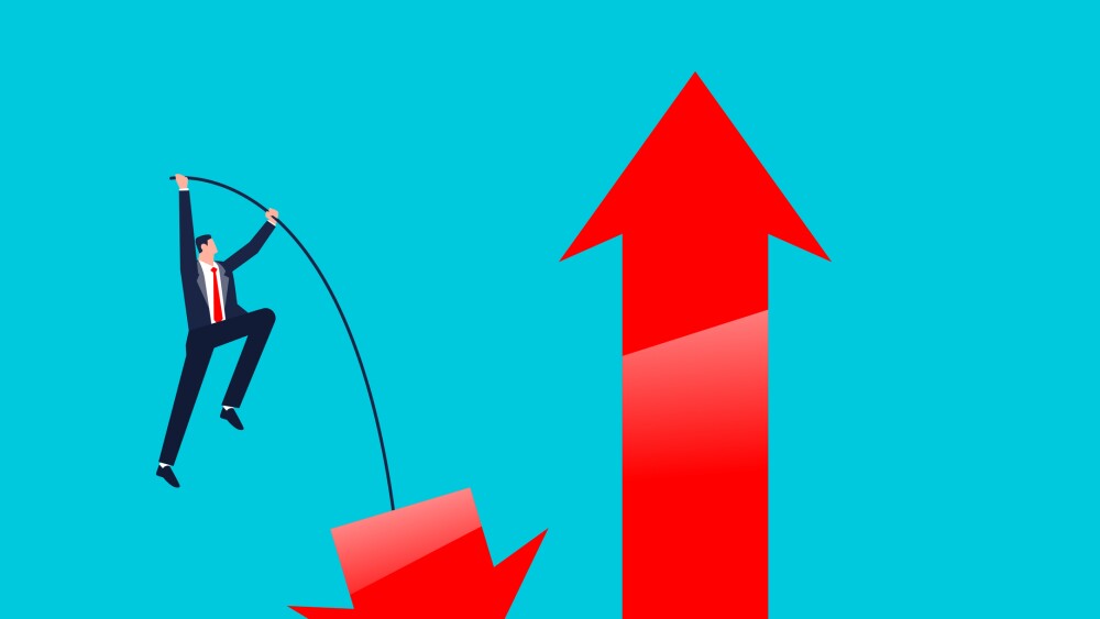Changing or transforming, turning around, challenging the odds and conquering adversity, a businessman pole vaulting from the down arrow to the up arrow of growth
