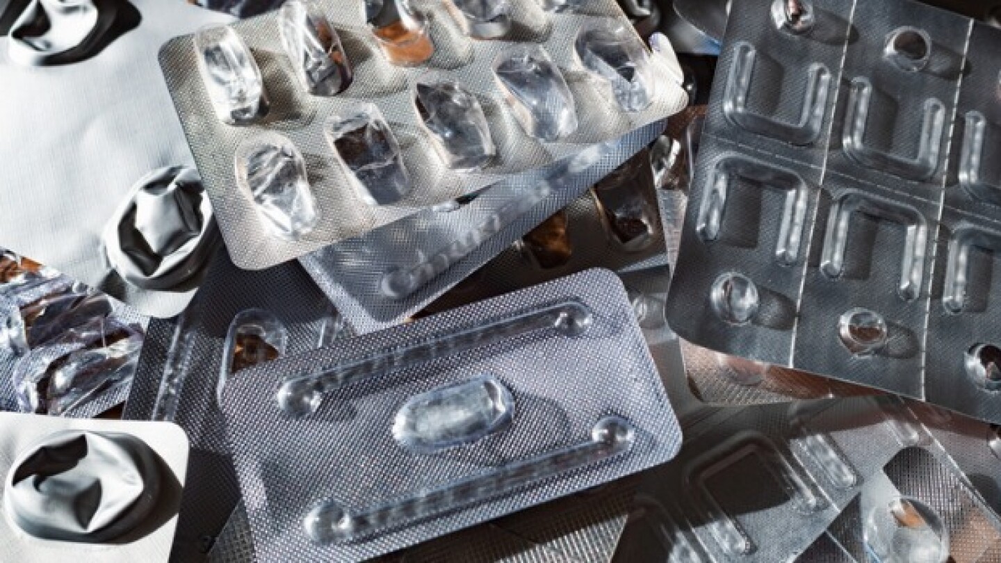 Pictured: Empty pill packs tossed together in a pile