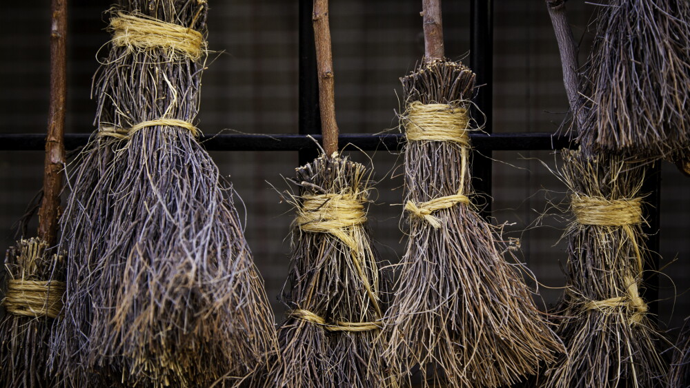 Detail of brooms for witches in halloween, detail of decoration and superstition, magic and mystery