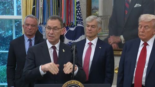 Pfizer CEO Albert Bourla speaks at the Oval Office, standing in front of a lectern next to President Donald Trump, Mehmet Oz, Robert F Kennedy Jr