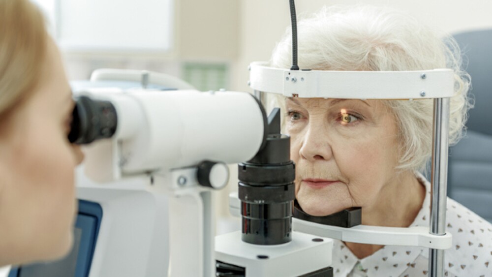 A patient being examined by an eye doctor/iStock,