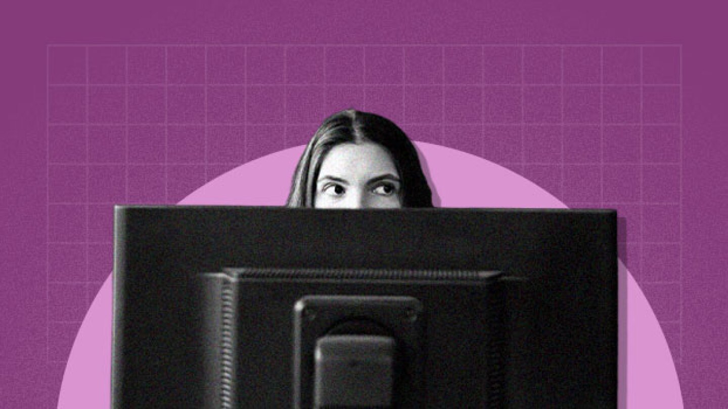 Pictured: Sneaky woman on computer/Taylor Tieden for BioSpace