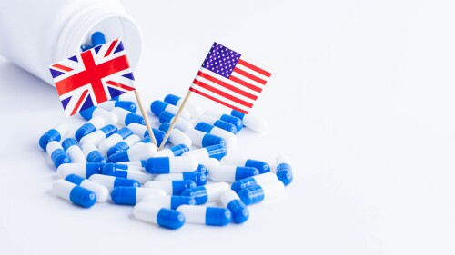 Tablets. Medicinal capsules on a white background. pharmacies in the country. medicines in the state. Lots of capsules for treatment. Pharmacy network of the country.