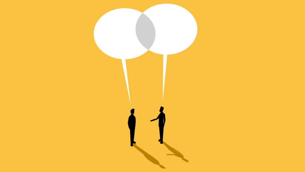 Illustration showing two businessmen negotiating with big speech bubbles next to each other