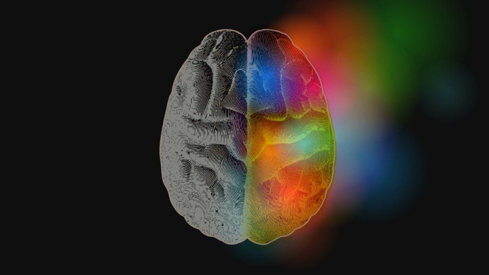 Creative concept of Left and right brain illustration with colorful on right side isolated on dark background