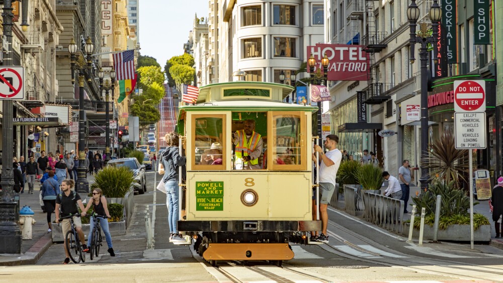San Francisco, USA - May 20, 2022: historic Cable Car Powell Hyde Line on turntable at Powell Street terminal at Market Street in downtown San Francisco, California CA, USA.