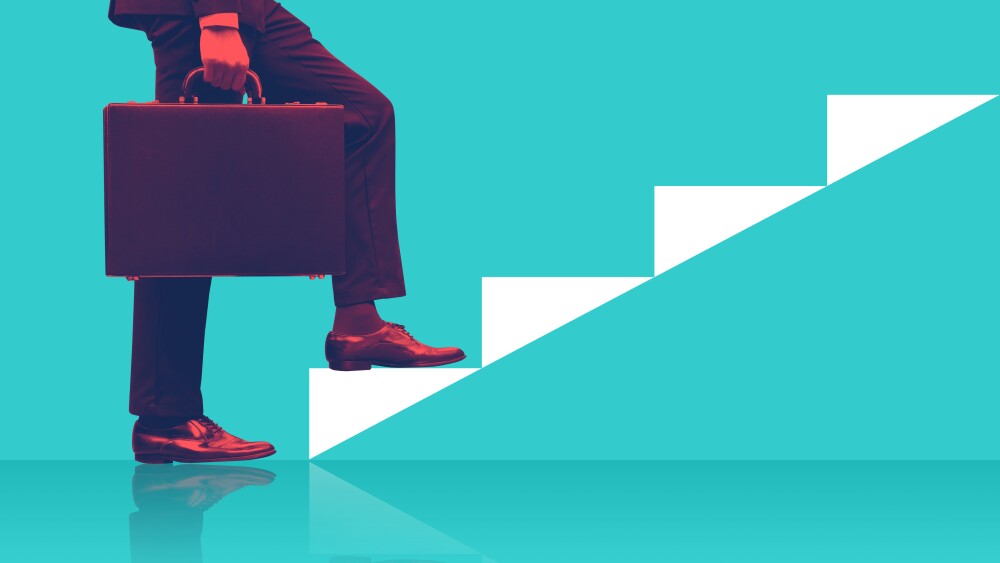 Businessman holding briefcase walking on graphic stair, start up business concepts.