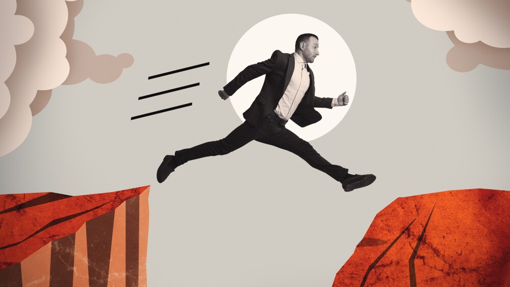 A businessman jumps over a cliff. Art collage.